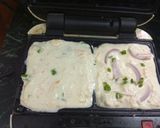 A picture of step 3 of Rava bread with cheese carrot stuffing.