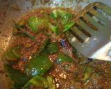 A picture of step 2 of Potato Capsicum curry.