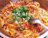 A picture of step 6 of Shakshuka with Leftover French Fries.