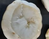 A picture of step 2 of Sausage meat stuffed patty pans.