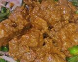 A picture of step 8 of Bhindi Gosht (okra).
