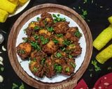 A picture of step 10 of Lasaniya Bhungla Batata.