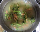 A picture of step 2 of Vegetable kichdi.