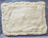 A picture of step 9 of Homemade Tuna Empanada.