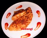 A picture of step 9 of Cheesy Potato Roti Pocket.