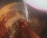 A picture of step 8 of Coconut party jollof rice.