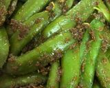 A picture of step 5 of Masala matar fali.