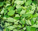 A picture of step 1 of Drumstick leaves with sun dried lentil dumplings.