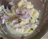 A picture of step 2 of Aloo pitika.