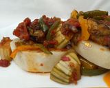 A picture of step 13 of Garden egg sauce with fish.