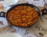 Foto del paso 8 de la receta: Paella de calamaritos y magro