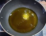A picture of step 2 of Instant Garlic Pickle.