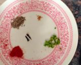 A picture of step 2 of Moong dal- Moong dal with clove and green chilli.