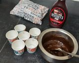 A picture of step 2 of Chocolate cup cakes with harshley Syrup and choco chips.