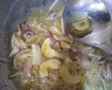 A picture of step 2 of Onion fried Rice.