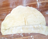 A picture of step 7 of Garlic Soft Layered Chapati.
