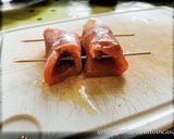 A picture of step 6 of Baked Trout Rolls with Eggplant and Cabbage Slaw.