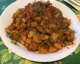 Une image de l'étape 12 de Pommes de terre sautées aux tomates, ail et épices.