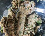 A picture of step 2 of Cheese spread spring onion potato sandwich.