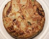 Foto del paso 11 de la receta Tortilla de patatas con cebollas, ajos y perejil