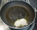A picture of step 8 of Spinach Corn Ravioli in white sauce.