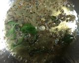A picture of step 2 of Baingan bharta with green peas.