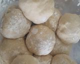 A picture of step 2 of White chapati (oiled thrice and rolled out twice).