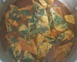 A picture of step 4 of Quick Sour Curry with Green Papaya and Omelet with Pak Wan Leaves (30-Minute Version).