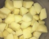 A picture of step 1 of Achari Aloo.