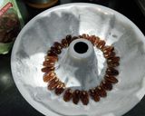A picture of step 10 of Eggless Traditional Christmas Fruit And Nut Cake.