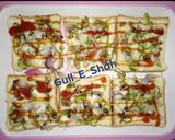 A picture of step 6 of Bread Pizza.