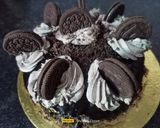 A picture of step 8 of Chocolate Oreo Overloaded Cake.