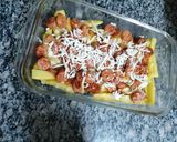 صورة لخطوة 4 من وصفة بطاطس لافا بالنقانق غير عن العادة 😋