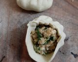 A picture of step 7 of Cheesy Paneer Palak momo.