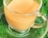 A picture of step 3 of Masala milk tea with spring onion pakoda.