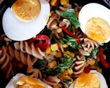A picture of step 2 of Veg Pasta with Egg and flavoured bacon bits carrot chips + Dip.
