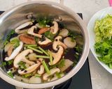 A picture of step 2 of Rice Papers in John Dory Soup.