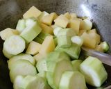 A picture of step 1 of Turai(Ridge gourd) Dry Curry.