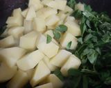 A picture of step 2 of Aloo methi with methi laccha paratha.