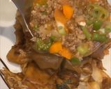 A picture of step 6 of Char Keow Teow with beef gravy.