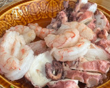 Foto del paso 6 de la receta: Arroz meloso de pulpo y gambones al ajillo
