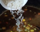 Foto del paso 6 de la receta: Arroz meloso de cerdo con vino tinto