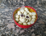Foto del paso 8 de la receta: Bombones de chocolate blanco con relleno de ganache de naranja