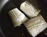 Foto del paso 7 de la receta Bacalao al pil pil con almejas y langostinos