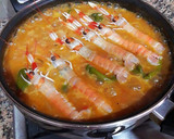 Foto del paso 22 de la receta: Arroz con jugos de cigalas, almejas y pimientos tipo padrón