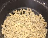 A picture of step 1 of Whole grain fusilli pasta with tomato basil sauce.