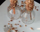 A picture of step 3 of Peanut coated Banana Lolly.
