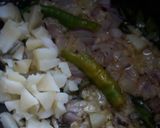A picture of step 1 of Kaanda Batata Poha (onion/potato poha).