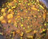 A picture of step 6 of Potato Peas Curry.