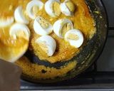 A picture of step 6 of Masala malai egg.